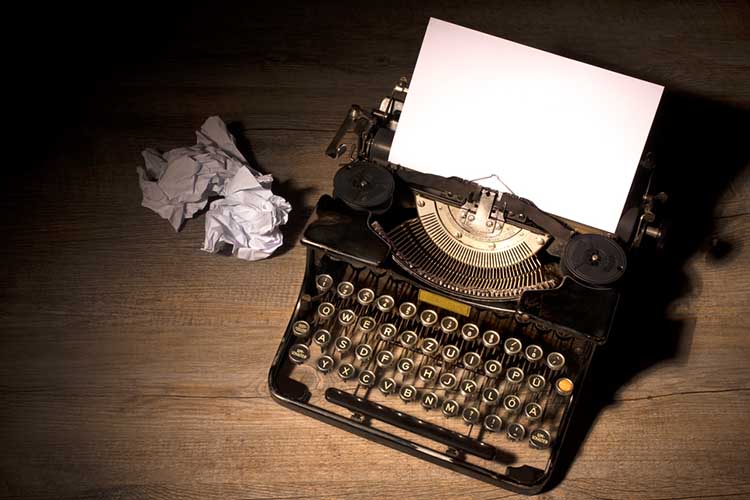 Typewriter and Scattered Papers